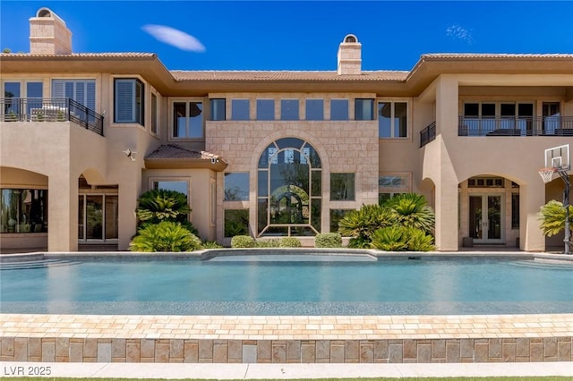 9801 Orient Express Ct, Las Vegas, NV 89145 - swimming pool featuring french doors