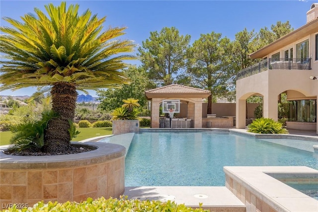 9801 Orient Express Ct, Las Vegas, NV 89145 - view of pool with a pool with connected hot tub and a patio area