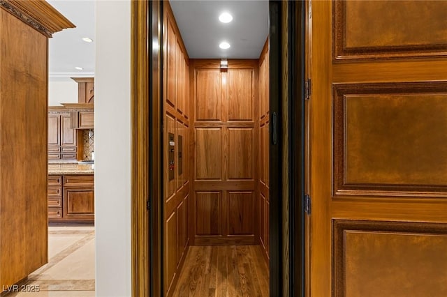 9801 Orient Express Ct, Las Vegas, NV 89145 - elevator with tasteful backsplash and recessed lighting