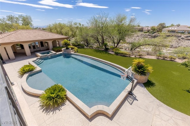 9801 Orient Express Ct, Las Vegas, NV 89145 - view of pool featuring a patio, a pool with connected hot tub, and a lawn