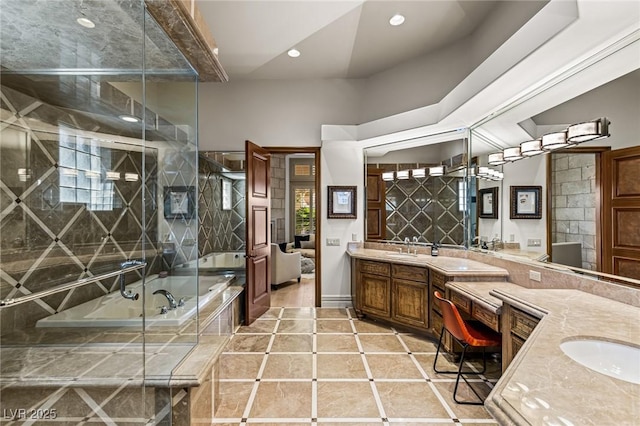 9801 Orient Express Ct, Las Vegas, NV 89145 - full bath featuring double vanity, a garden tub, tile patterned floors, recessed lighting, and a shower with door