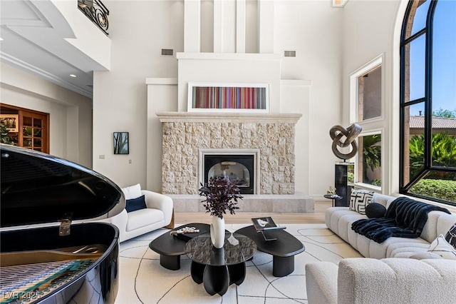 9801 Orient Express Ct, Las Vegas, NV 89145 - living room with a towering ceiling, a fireplace, and recessed lighting