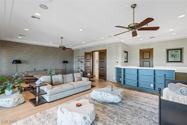 9801 Orient Express Ct, Las Vegas, NV 89145 - living area featuring ceiling fan, wood finished floors, recessed lighting, attic access, and crown molding