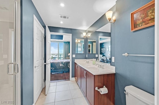 150 Las Vegas Blvd Unit 1004, Las Vegas, NV 89101 - ensuite bathroom featuring double vanity, tile patterned floors, and a stall shower