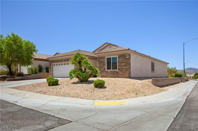 2563 Sargon St, Henderson, NV 89044 - single story home featuring a garage, driveway, and stucco siding