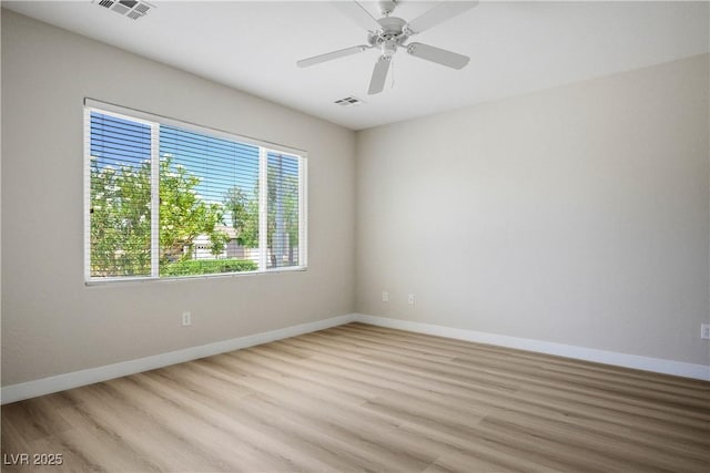 2563 Sargon St, Henderson, NV 89044 - empty room with light wood-style floors and ceiling fan