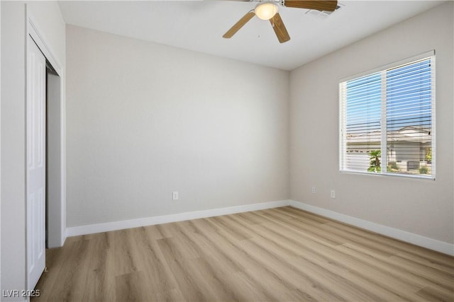 2563 Sargon St, Henderson, NV 89044 - unfurnished bedroom featuring light wood-style flooring, a closet, and a ceiling fan