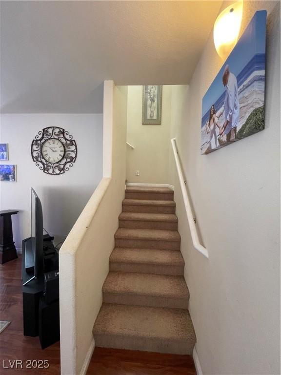 5625 Fast Payout Ct, Las Vegas, NV 89122 - stairs with wood finished floors and baseboards