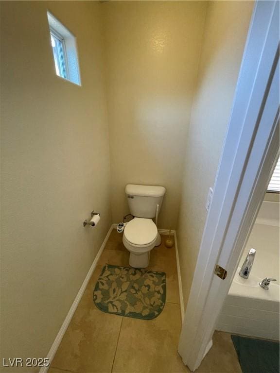 5625 Fast Payout Ct, Las Vegas, NV 89122 - bathroom with tile patterned floors and a bath