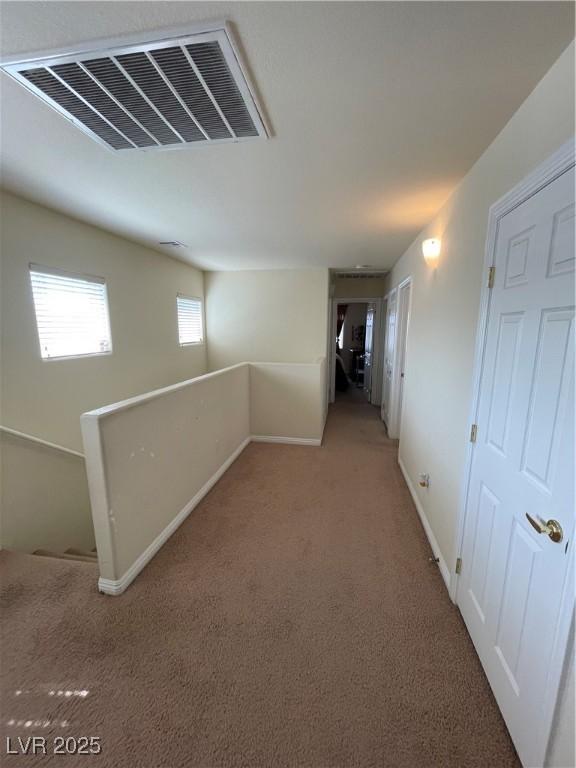 5625 Fast Payout Ct, Las Vegas, NV 89122 - hall featuring an upstairs landing and carpet