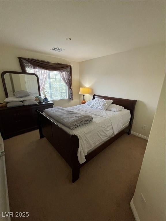 5625 Fast Payout Ct, Las Vegas, NV 89122 - bedroom featuring carpet flooring and baseboards