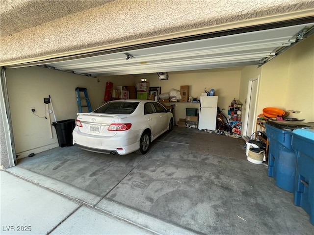 5625 Fast Payout Ct, Las Vegas, NV 89122 - garage with freestanding refrigerator