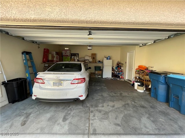 5625 Fast Payout Ct, Las Vegas, NV 89122 - garage with freestanding refrigerator