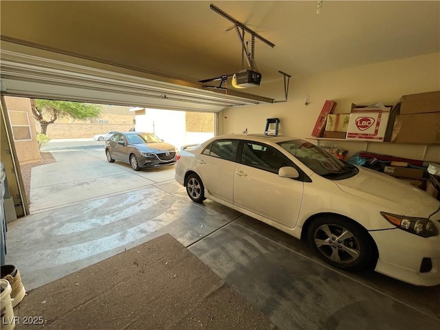 5625 Fast Payout Ct, Las Vegas, NV 89122 - garage featuring a garage door opener