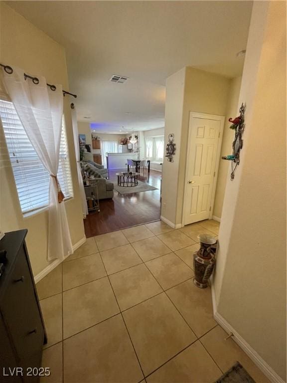 5625 Fast Payout Ct, Las Vegas, NV 89122 - hallway with tile patterned flooring and baseboards