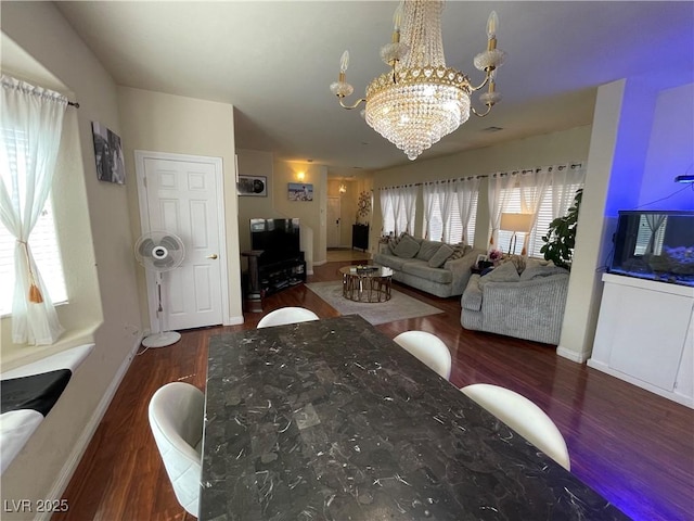 5625 Fast Payout Ct, Las Vegas, NV 89122 - living area with a chandelier and wood finished floors