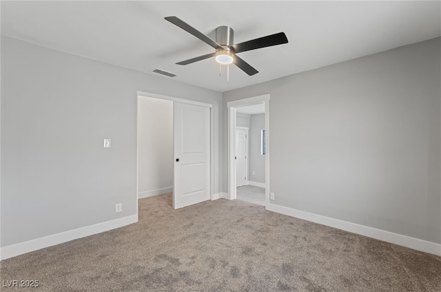 2222 N Martin L King Blvd, Las Vegas, NV 89106 - unfurnished bedroom with carpet floors, a closet, and a ceiling fan