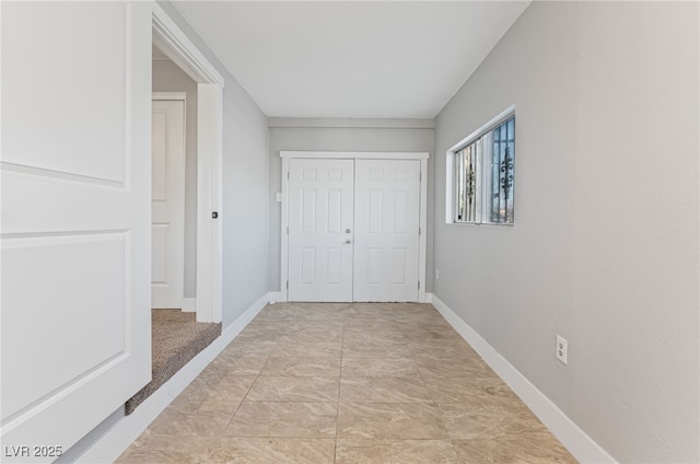 2222 N Martin L King Blvd, Las Vegas, NV 89106 - hallway with baseboards and light marble finish floors
