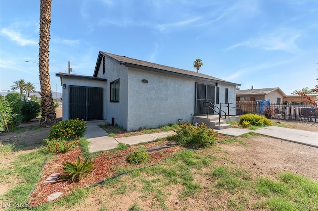 2222 N Martin L King Blvd, Las Vegas, NV 89106 - rear view of property with stucco siding