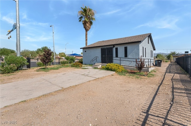 2222 N Martin L King Blvd, Las Vegas, NV 89106 - bungalow-style house with stucco siding and a shingled roof