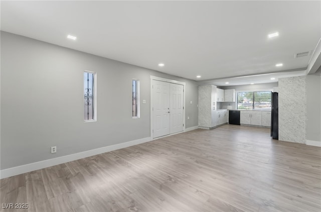 2222 N Martin L King Blvd, Las Vegas, NV 89106 - unfurnished living room featuring recessed lighting and light wood finished floors