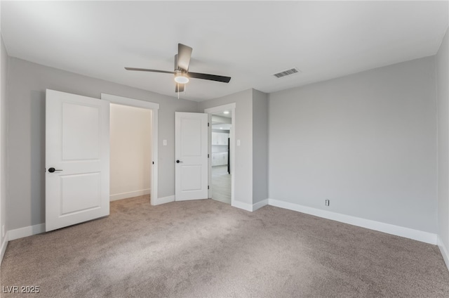 2222 N Martin L King Blvd, Las Vegas, NV 89106 - unfurnished bedroom featuring carpet flooring and ceiling fan