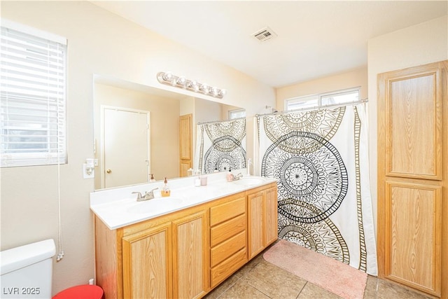 1453 Evening Song Ave, Henderson, NV 89012 - full bath with double vanity, tile patterned flooring, and a shower with shower curtain