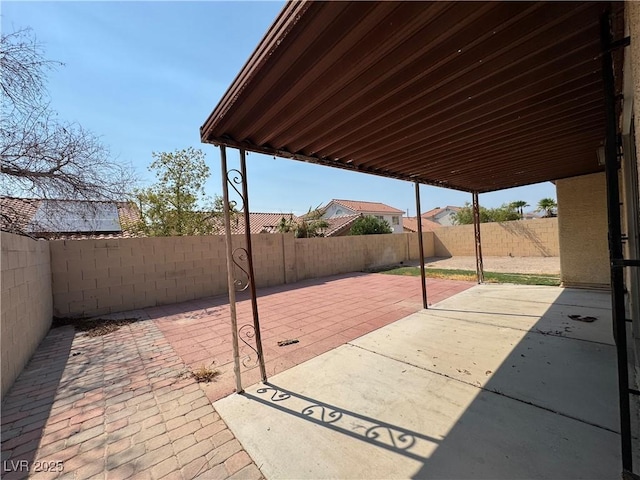 2503 River Oaks Dr, Las Vegas, NV 89156 - fenced backyard featuring a patio