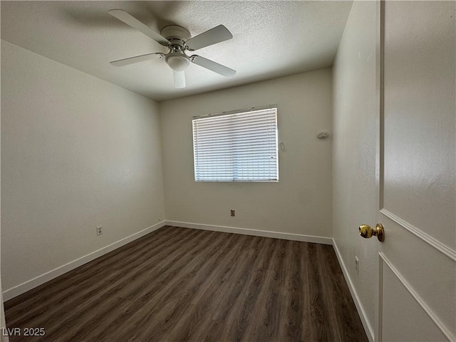 2503 River Oaks Dr, Las Vegas, NV 89156 - spare room with dark wood-style flooring and a ceiling fan