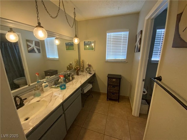 5753 E Monroe Ave, Las Vegas, NV 89110 - bathroom with vanity and tile patterned flooring