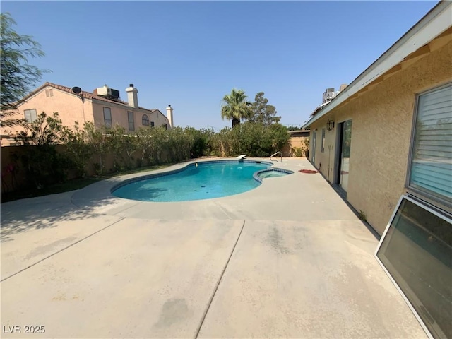 5753 E Monroe Ave, Las Vegas, NV 89110 - view of pool with a patio and a diving board