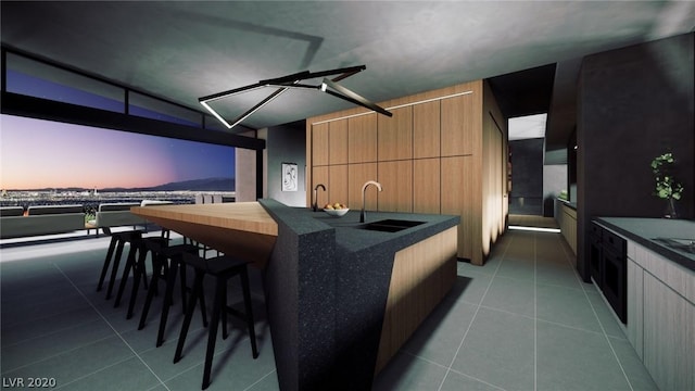 1522 Dragon Crst, Henderson, NV 89012 - kitchen with dark tile floors and sink