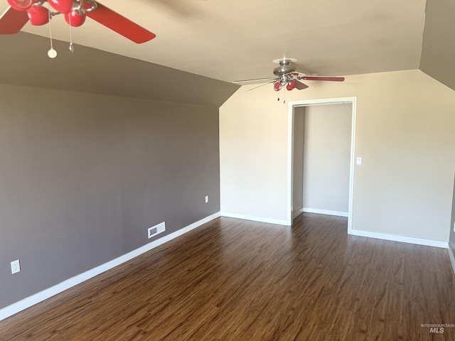 11349 W Marlinwood St, Boise, ID 83713 - spare room featuring a ceiling fan, vaulted ceiling, and dark wood finished floors
