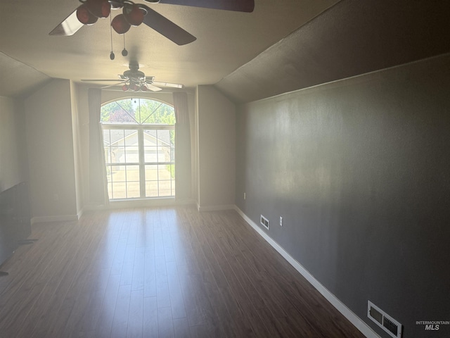 11349 W Marlinwood St, Boise, ID 83713 - additional living space featuring a ceiling fan, vaulted ceiling, and dark wood-style floors