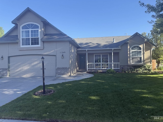 11349 W Marlinwood St, Boise, ID 83713 - view of front of property with brick siding, covered porch, and a front yard