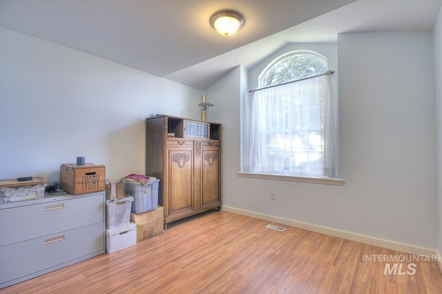 11349 W Marlinwood St, Boise, ID 83713 - bedroom featuring light wood-style flooring and vaulted ceiling