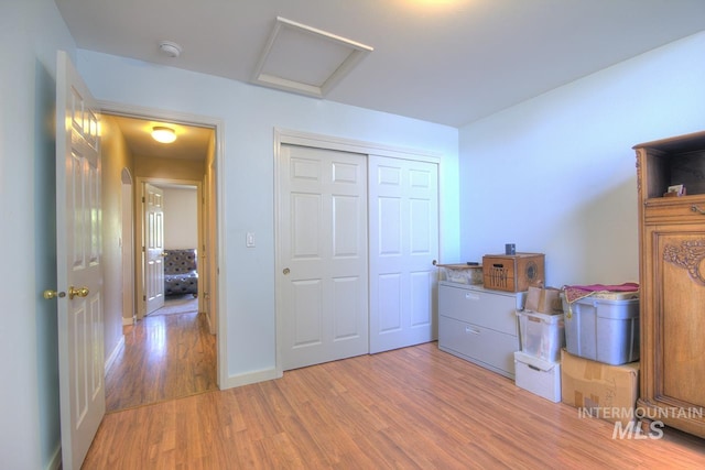 11349 W Marlinwood St, Boise, ID 83713 - bedroom with light wood-style floors, attic access, and a closet