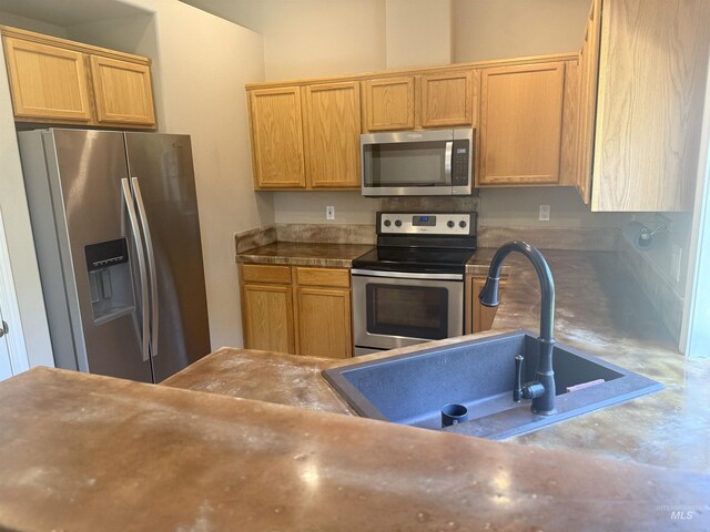 11349 W Marlinwood St, Boise, ID 83713 - kitchen with appliances with stainless steel finishes and concrete floors