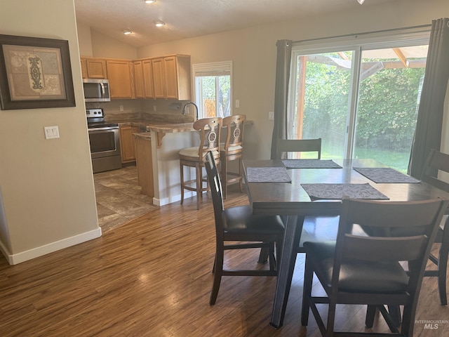 11349 W Marlinwood St, Boise, ID 83713 - dining room with dark wood-style flooring and lofted ceiling