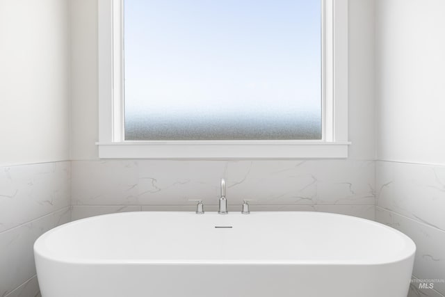 1351 E Andes Dr, Kuna, ID 83634 - full bath featuring a soaking tub and healthy amount of natural light