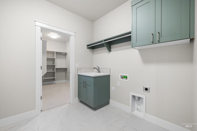 1351 E Andes Dr, Kuna, ID 83634 - laundry area with electric dryer hookup, cabinet space, washer hookup, baseboards, and light marble finish flooring