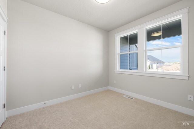 1351 E Andes Dr, Kuna, ID 83634 - carpeted spare room featuring baseboards