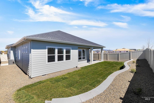 1351 E Andes Dr, Kuna, ID 83634 - rear view of house featuring roof with shingles