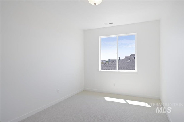 5509 N Patimos Ave, Meridian, ID 83646 - spare room featuring visible vents, baseboards, and light carpet