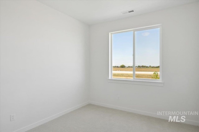 5509 N Patimos Ave, Meridian, ID 83646 - empty room featuring baseboards, light colored carpet, and visible vents
