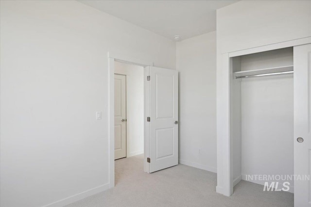 5509 N Patimos Ave, Meridian, ID 83646 - unfurnished bedroom with a closet, carpet, and baseboards