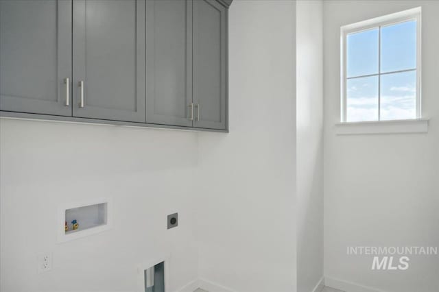 5509 N Patimos Ave, Meridian, ID 83646 - laundry area featuring electric dryer hookup, hookup for a washing machine, cabinet space, and baseboards