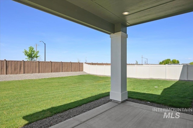 5509 N Patimos Ave, Meridian, ID 83646 - view of yard with a fenced backyard and a patio area