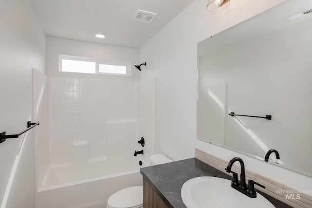 full bathroom featuring vanity, toilet, and shower / bathtub combination