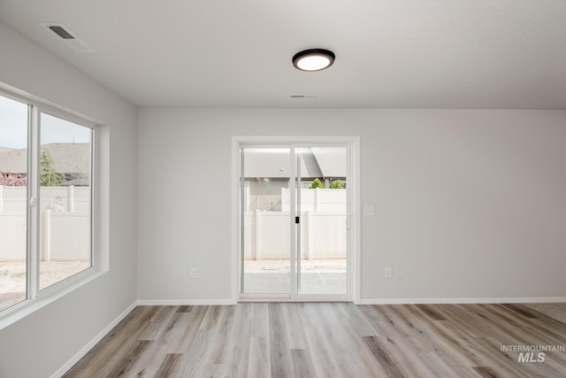 empty room featuring light wood-type flooring